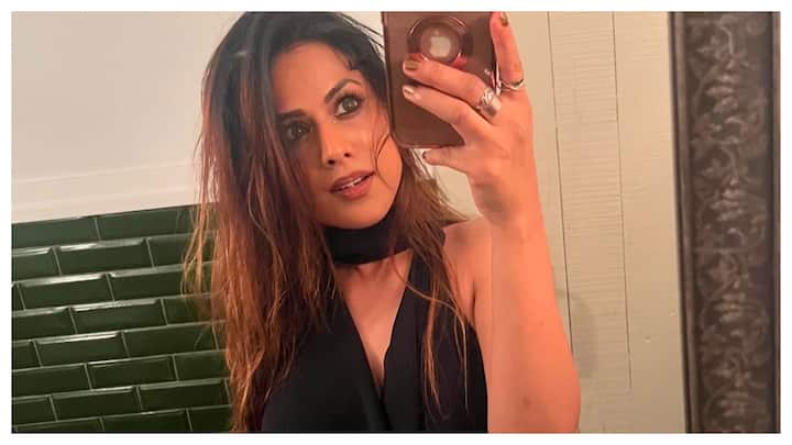 The 'Jamai Raja', 'Naagin 4' fame actress Nia Sharma has set the internet on fire with her new sizzling hot look in a black outfit.