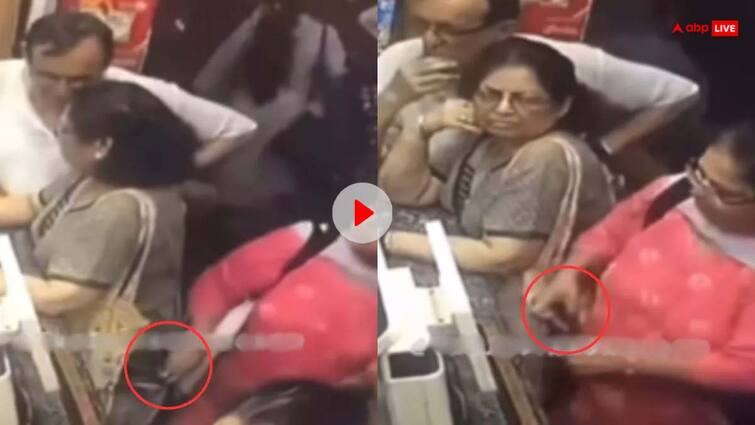 Watch Aunty caughting in camera stealing goods from bag video goes viral Watch: आंटी ने पलक झपकते ही बैग से पार कर दिया सामान, CCTV में कैद हुई चोरी की घटना