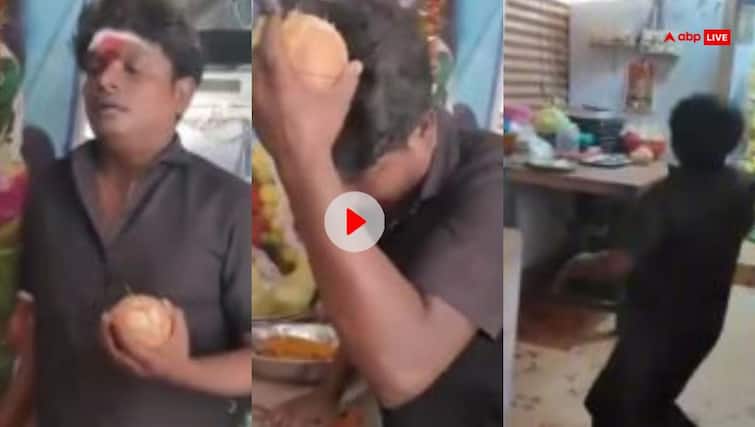 Viral video man broke a coconut on his head became unconscious watch video Viral Video: मंदिर में पूजा के दौरान शख्स ने सिर पर फोड़ा नारियल, पलक झपकते ही पड़ गए लेने के देने!