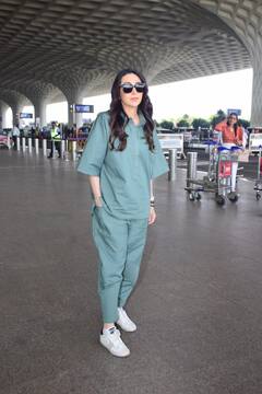 करिश्माच्या एअरपोर्ट लूकवर चाहते घायाळ; 49 व्या वर्षीही दिसते झकास!