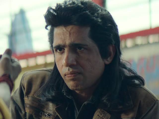 Gulshan Devaiah's portrayal of Chaar cut Aatmaram in 'Guns and Gulaabs' was nothing short of iconic. His magnetic presence and impeccable delivery breathed life into the character, creating waves in Bollywood. Devaiah's portrayal added richness and depth to the story, cementing his status as one of the industry's most versatile actors. (Image Source: Special Arrangement)