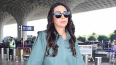 करिश्माच्या एअरपोर्ट लूकवर चाहते घायाळ; 49 व्या वर्षीही दिसते झकास!