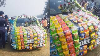 Groom’s baaraat arrives in car with chips packet decor Internet has questions Watch Video: சிப்ஸ் பாக்கெட்களால் அலங்கரிக்கப்பட்ட மணமகனின் கார் - நீங்களே பாருங்க!