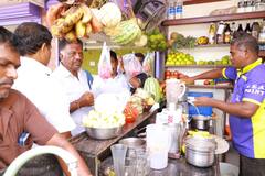 IN PICS: Former TN CM & Ramand LS Candidate O Panneerselvam Makes Bajji To Woo Voters During Campaign