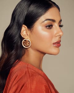 Samyuktha Menon Photos : ஆரஞ்சு மிட்டாய் போல் இருக்கும் வாத்தி நடிகை சம்யுக்தா!