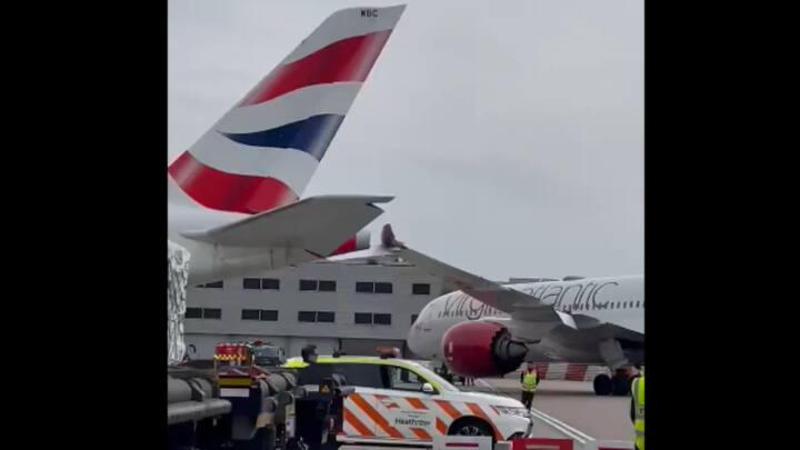 Virgin Atlantic And British Airways Passenger Planes Clip Wings At London's Heathrow Airport Virgin Atlantic And British Airways Passenger Planes Clip Wings At London's Heathrow Airport
