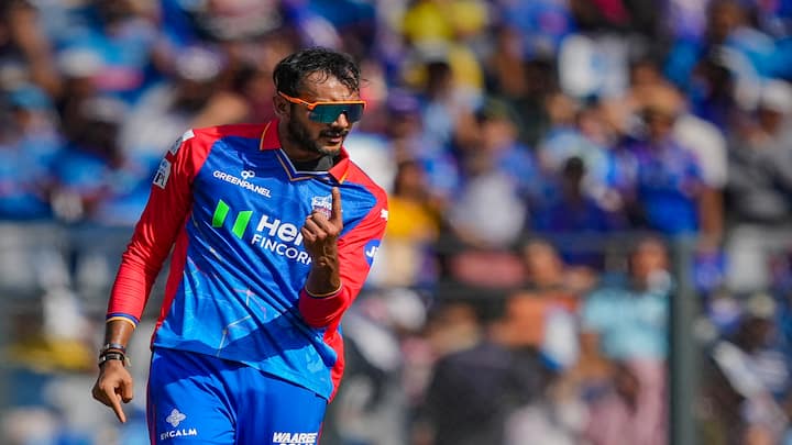 Axar Patel had the best figures against MI 's onslaught, finishing with figures of 2/35 off his 4 overs. (Image Source: PTI)