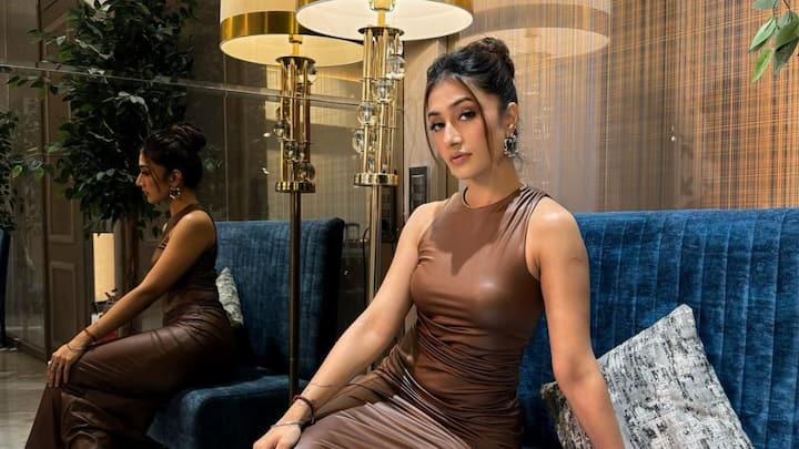 Dhanashree Verma treated fans with pictures in brown bodycon dress looking dapper as ever.