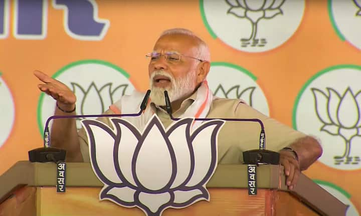 PM Narendra Modi during his address at the BJP's 'Vijay Sankalp Sankhnad' rally in Chhattisgarh's Bastar district criticised Congress for allegedly neglecting the needs of the poor since Independence. (Image Source: PTI)