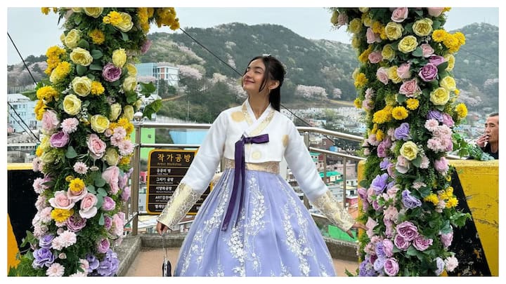 Actress Anushka Sen, who is on a vacation to Busan, South Korea on Monday shared pictures wearing a Korean hanbok, and is 'living the k drama moments'.