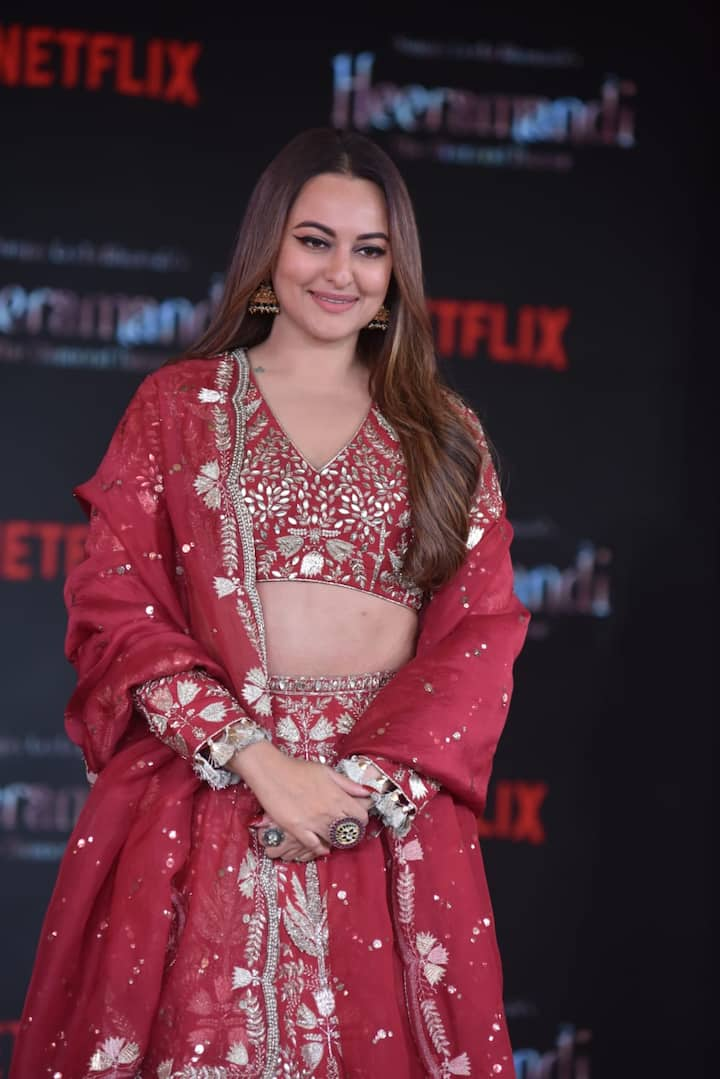 Sonakshi Sinha looks beautiful in a red lehenga.