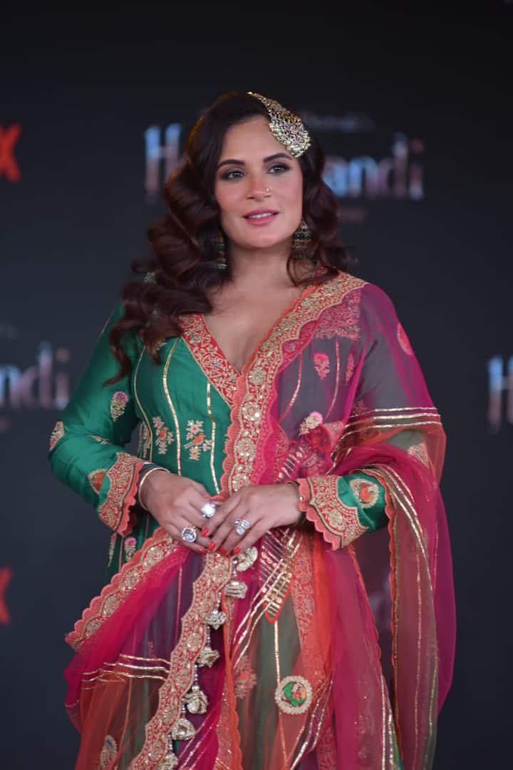 Richa Chadha attended the event in a multi coloured suit. She accessorised her look with side maang tika.