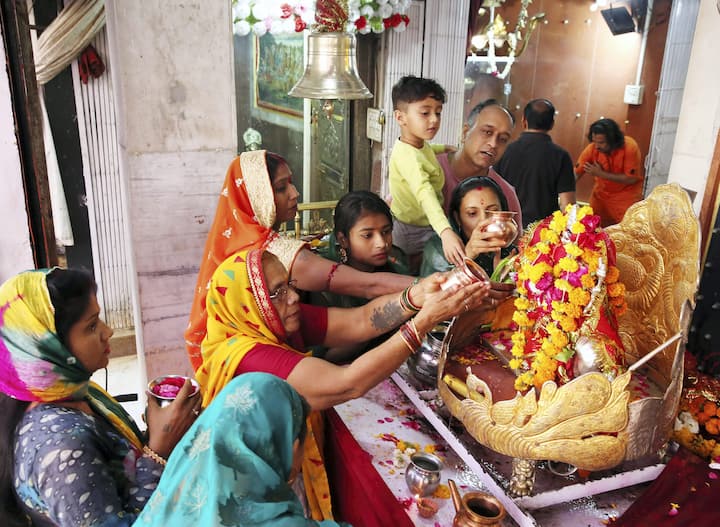 Devotees offer prayers at a temple on the first day of the 'Chaitra Navratri' festival, in Bhopal. (Image Source: PTI)