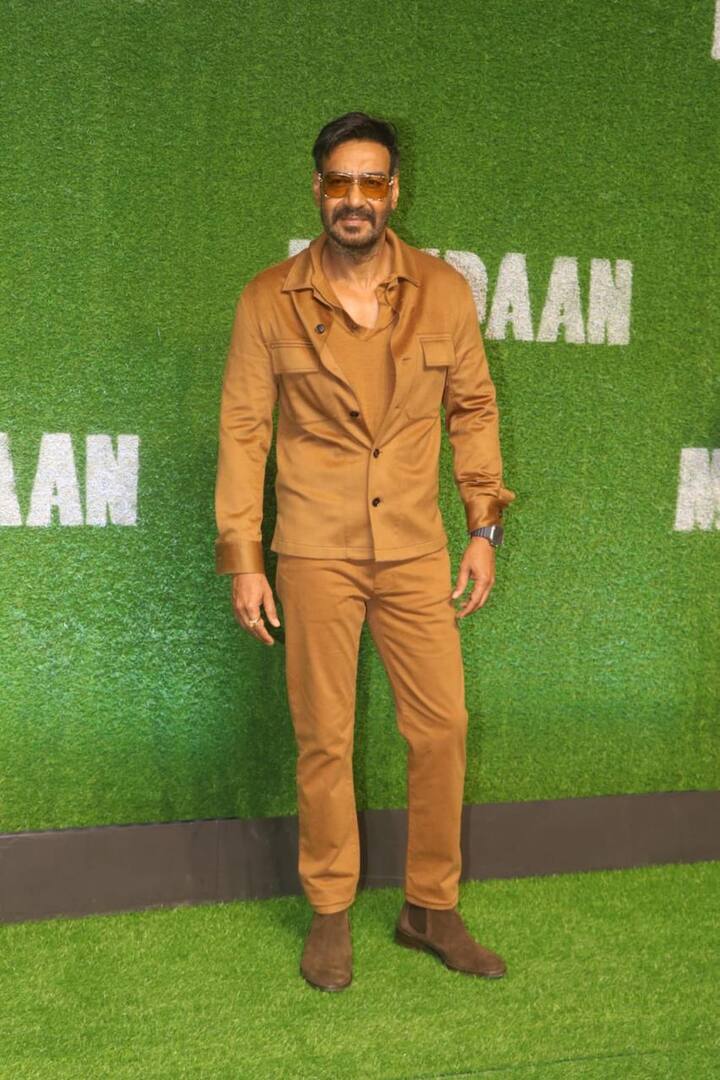 Ajay Devgn attended the screening wearing brown colour shirt and pant.