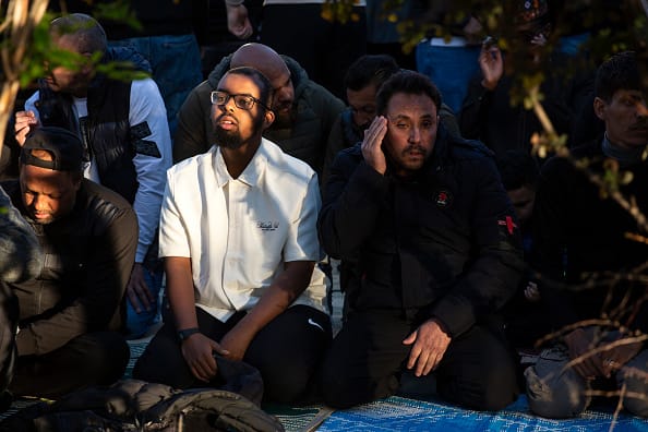 Muslims pray in front of the Central Mosque of Sofia - Banya Bashi Mosque, marking the end of the Islamic holy month of Ramadan and celebrating the holiday of Eid al-Fitr in Sofia, Bulgaria. (Image Source: Getty)