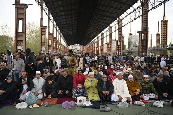 Muslims join for prayers during the Eid al-Fitr celebration on April 10, 2024 in Turin, Italy. (Image Source: Getty)