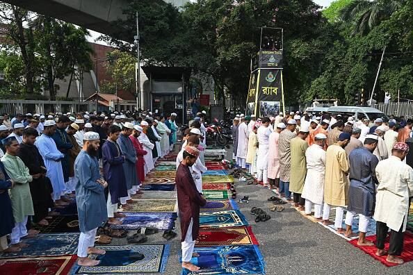 Muslim devotees offered Eid-al-Fitr prayers, which marked the end of the holy fasting month of Ramadan, in Dhaka on April 11. (Image Source: Getty)