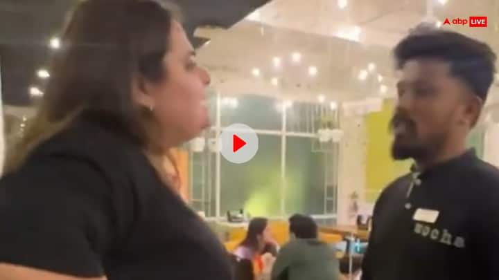gujarati woman fight over serving non veg burger in Restaurant video goes viral Watch: वेज की जगह परोसा नॉन-वेज बर्गर, स्टॉफ पर भड़की महिला, बोली- सॉरी का मैं क्या करूं?