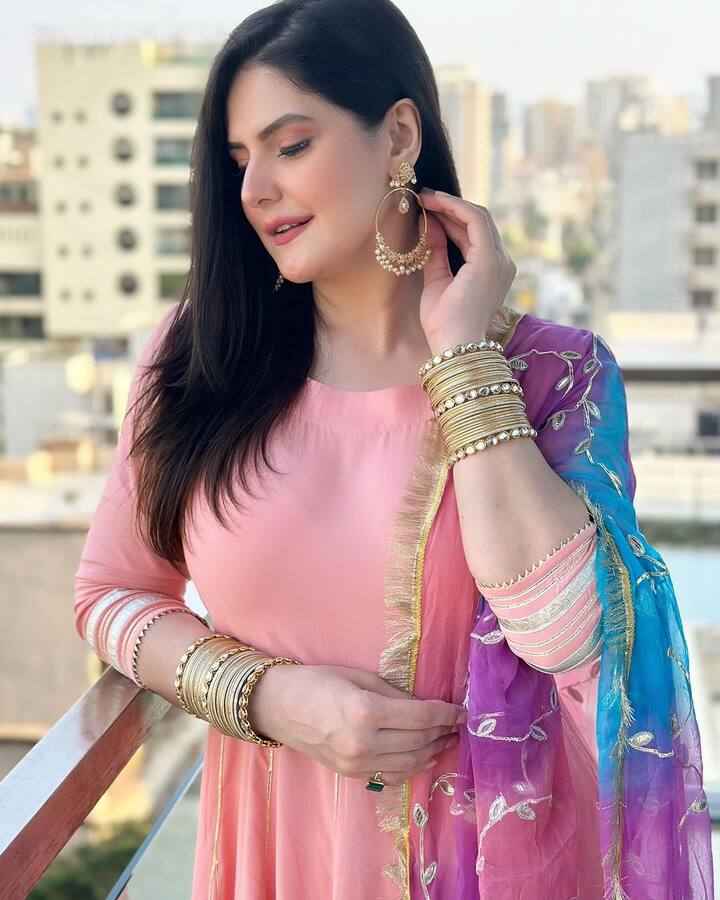 Zareen Khan looked elegant in a baby pink ethic suit with a contrasting dupatta
