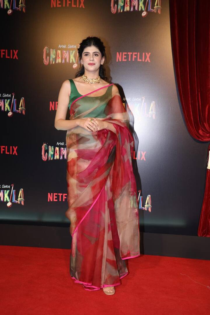 Sanjana Sanghi attended the screening in a red saree with green blouse.