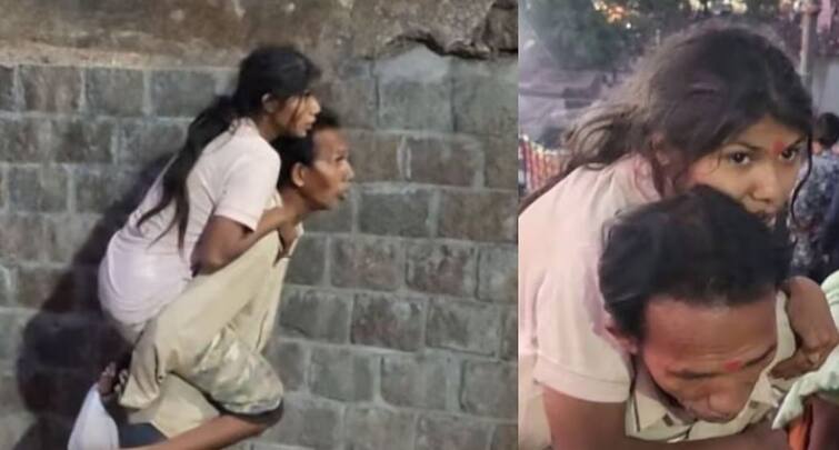 A 50-year-old father climbed the mountain of Pavagadh carrying his 16-year-old handicap   daughter દિવ્યાંગ 16 વર્ષની દીકરીને ખભા પર ઊંચકીને પિતા પાવાગઢનો ડુંગર ચઢ્યાં, જુઓ ભાવુક કરી દેતો વીડિયો