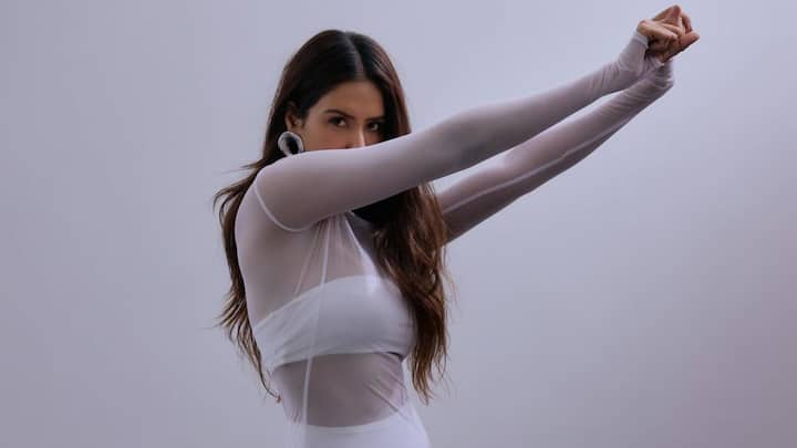 Sonam Bajwa treated fans with pictures in a white sheer bodycon dress looking dapper as ever