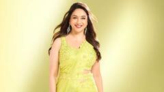 Madhuri Dixit : पिवळ्या साडीत माधुरीने वेधलं लक्ष; पाहा फोटो!