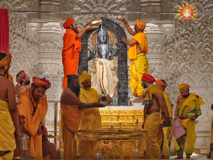Priests perform 'abhishek' of Ram Lalla on the occasion of 'Ram Navami' festival, at the Ram Temple in Ayodhya, . (Image source: PTI Images)