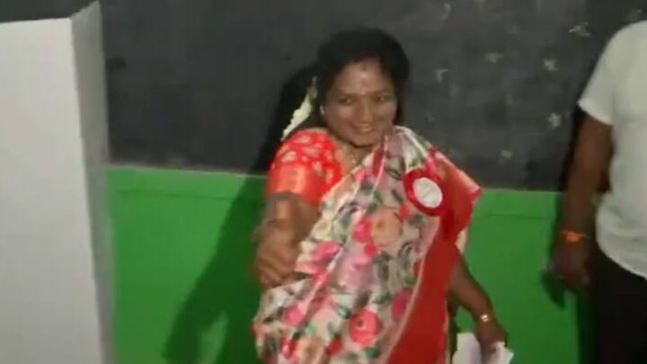 Tamilisai Soundarajan, BJP's South Chennai candidate, gives a thumbs-up to the media, as she walks out after casting her at a polling booth in Saligramam, Chennai. (Photo: ANI)