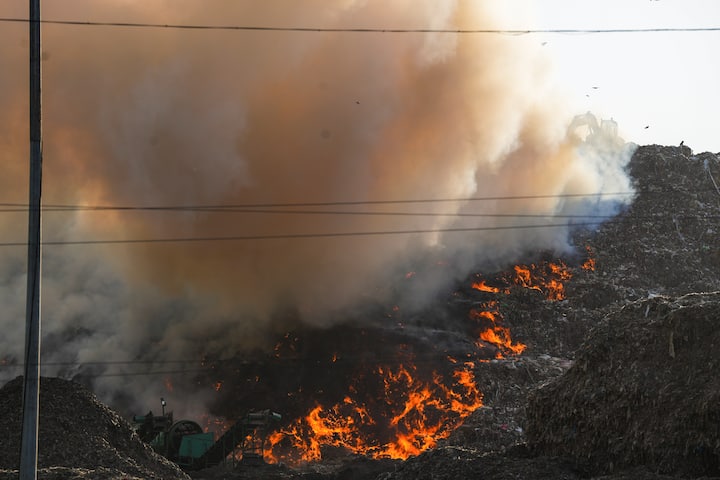 Smoke spread all around after a massive fire broke out at the Ghazipur landfill site in East Delhi.