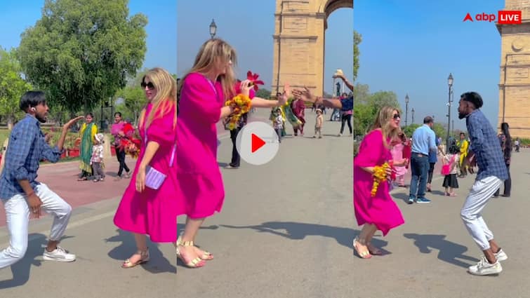 Russian girl dance with indian man on Bhojpuri song at Delhi India Gate watch viral Video Watch: भोजपुरी गाने पर रशियन लड़की के साथ युवक ने लगाए ठुमके, इंडिया गेट का ये वीडियो हुआ वायरल