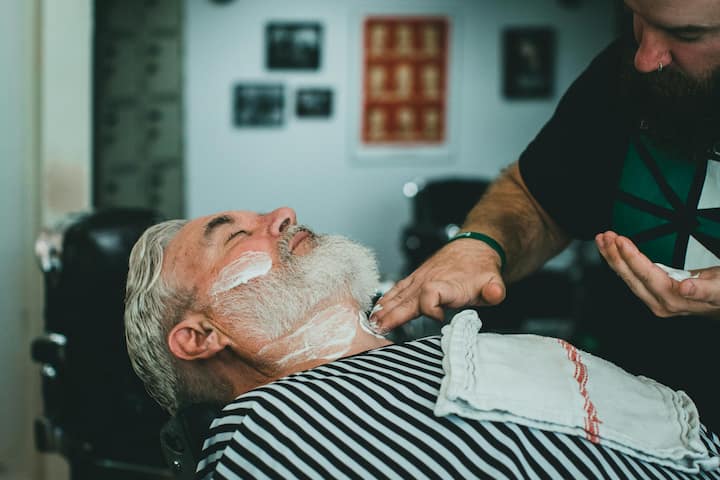 Razor is used for shaving.  In this process the hair is cleaned with the help of blades.  After this the skin becomes smooth i.e. hair is not visible on it.  It also exfoliates the skin, getting rid of dead skin cells that accumulate on the face and take longer to regrow than trimming (Photo credit: pexels)
