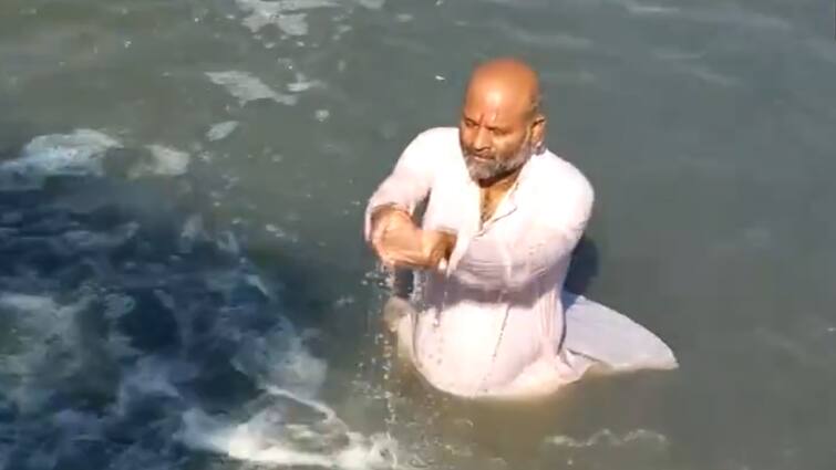 Lok Sabha Elections 2024 Ujjain Congress Candidate Protests Against Drain Water Polluting Shipra River Congress Ujjain Candidate Takes 'Protest Dip' In Polluted Shipra River — WATCH