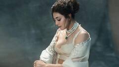 Kajal Aggarwal Latest Photos : కాజల్ అగర్వాల్​ డిస్నీ ప్రిన్సెస్​ లుక్​ చూశారా.. వైట్​ లెహంగాలో హంసలా మారిపోయిన హీరోయిన్