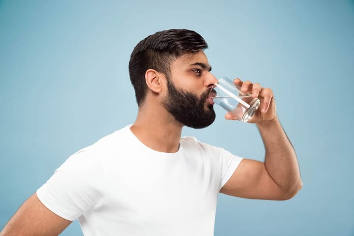 If you feel like drinking more water when your body is hot or you feel dehydrated, don't drink a lot of water at once.  Take some water in a glass and add salt to it.  It will not cause water toxicity.  Apart from this, drinking coconut water, lemon water, fresh fruit juices quenches thirst and there is no risk of water toxicity.