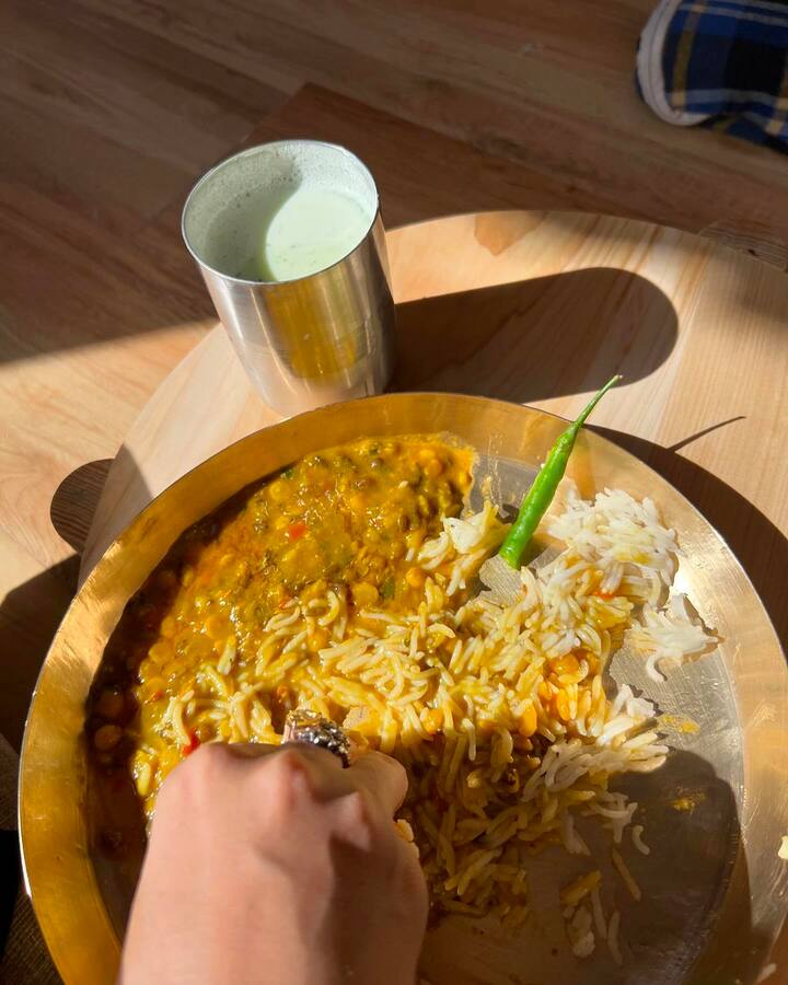 The last picture is a peek into the local food -- dal, chawal, and raita.