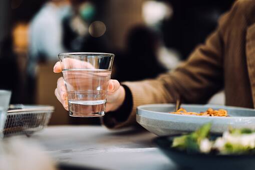 2. Drinking Water with meals or after meals- Drinking water with meals is something a majority of individuals are seen doing. This dilutes the digestive juices in your stomach, making it hard for your body to break down the food. (Image Source: Getty)