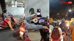 कभी देखा है वर्क फ्रॉम ट्रैफिक? महिला ने बीच ट्रैफिक को ही बना लिया अपना ऑफिस...लोग बोले गिरफ्तार करो