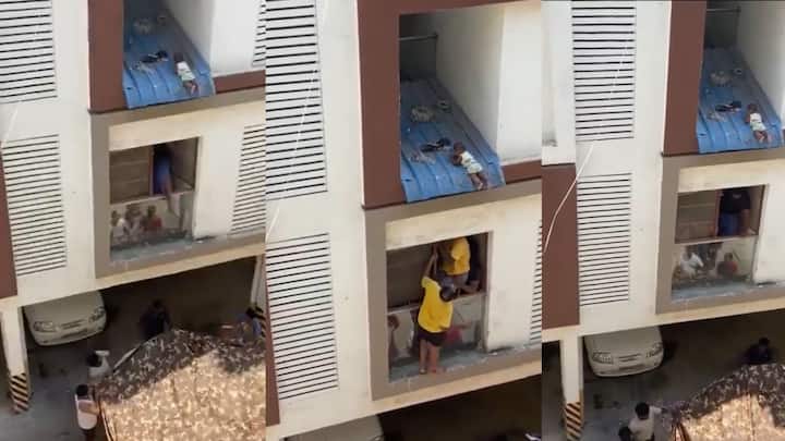 Tamil Nadu Viral Video Chennai Residents Risk Lives Rescue Toddler Dangling Roof Chennai Apartment WATCH Trending Chennai: Residents Risk Their Lives To Rescue Toddler Dangling From Apartment Roof — WATCH