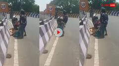 Video: ਸੜਕ ਵਿਚਾਲੇ ਸਿਰਫਿਰਾ ਪਤਨੀ ਨੂੰ ਲੱਗਿਆ ਕੁੱਟਣ, ਫਿਰ ਪੁੱਲ ਤੋਂ ਥੱਲ੍ਹੇ ਸੁੱਟਣ ਦੀ ਕੀਤੀ ਕੋਸ਼ਿਸ਼, ਦੇਖੋ ਖੌਫਨਾਕ ਵੀਡੀਓ