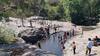 Kumbakkarai Falls: சுட்டெரிக்கும் கோடை வெயில்... குளம்போல் தேங்கிய  நீரில் குளிக்கும் சுற்றுலா பயணிகள்