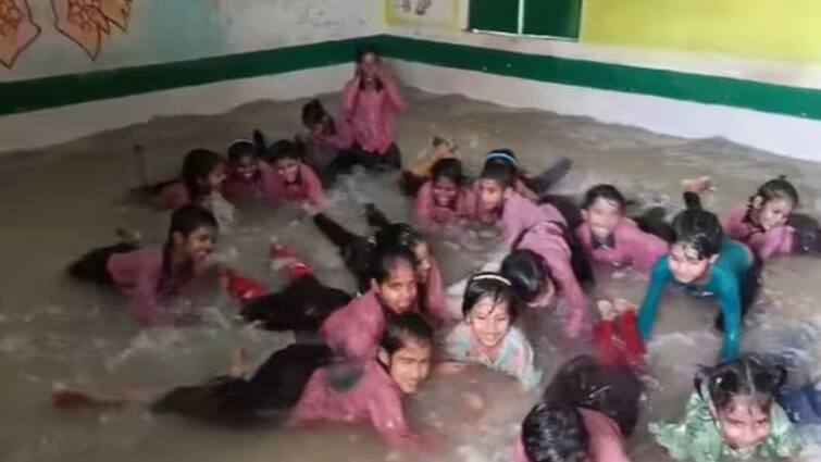 UP school teachers build an artificial pool in class students rejoice. Watch viral video Watch Video: வெப்ப அலை தாக்கம் - வகுப்பறையில் ‘குட்டி நீச்சல் குளம்’ உருவாக்கிய அரசுப் பள்ளி - வைரல் வீடியோ!