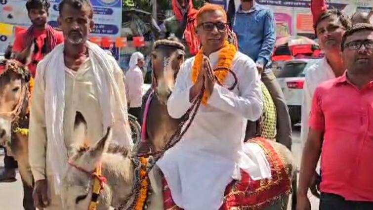 Independent candidate Satyendra Baitha came to Gopalganj to nominate sitting on donkey ann VIDEO: गोपालगंज में 'गधे' पर बैठकर नामांकन करने पहुंचे थे प्रत्याशी, भीड़ देख लगा दौड़ लगाने