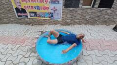 स्विमिंग पूल के किनारे बाथ टब में नहाने लगे सपा विधायक, किया अनोखा विरोध प्रदर्शन, देखें Video