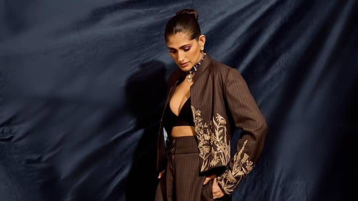 Kubbra Sait treated fans with pictures in a dusky pant suit looking dapper as ever. See pics