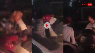 Video: बीच फ्लाईओवर दे दनादन...कार टच होने पर बाइक सवार ने हेलमेट उठाकर कर दी धुनाई, वायरल हुआ वीडियो