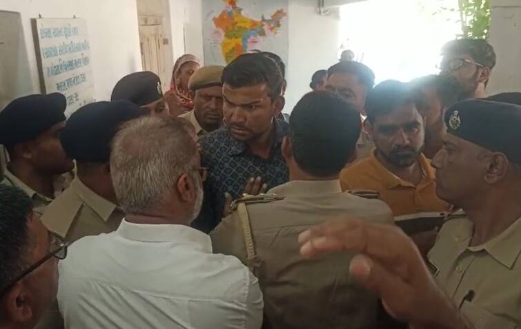 Congress workers complained about the suspicion of EVM machine at election polling booth in Modasa Lok sabha Election 2024: ઇવીએમમાં ખામીને લઇને મોડાસામાં બબાલ,  EVM  મશીન પર શંકા જતાં લોકો  તૂટી પડયાં, ઘટનાનો જુઓ વીડિયો