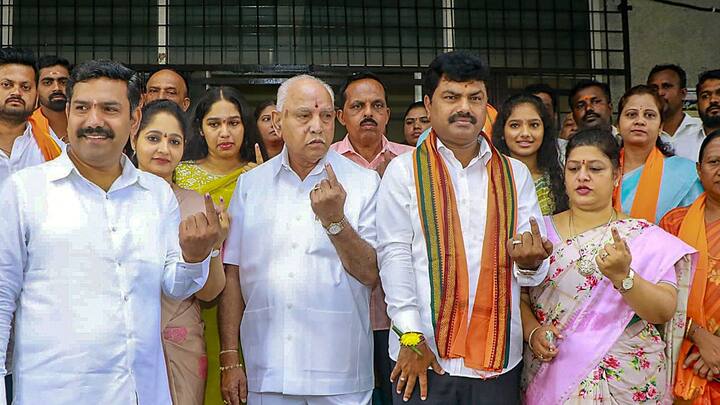 Ex-Karnataka CM B.S. Yediyurappa casts his vote along with his family in Shivamogga. (image source: PTI)