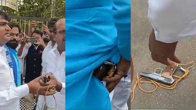 BSP candidate Satendra Maurya Seen with Pistol during file nomination Video Viral on Social Media Watch कमर में पिस्टल लेकर नामांकन करने पहुंचे BSP प्रत्याशी, आनन-फानन में जमीन पर गिरी, देखें Video
