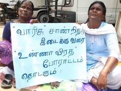 வாரிசு சான்றிதழ் கேட்டு பெண்மணி உண்ணாவிரத போராட்டம் - கரூரில் பரபரப்பு